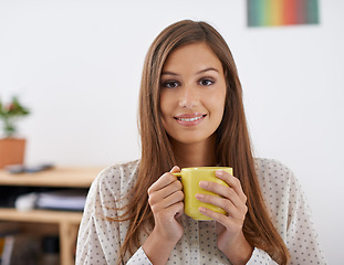 Image showing Happy, portrait and woman on coffee break in office and relax with drink at desk in London. Professional, person and enjoy green tea or latte with espresso in morning at workplace for calm moment