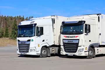 Image showing White DAF XF Heavy Trucks of Two Generations