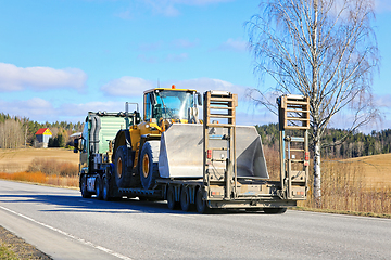 Image showing Truck Transports Wheel Loader on Low Loader Semitrailer