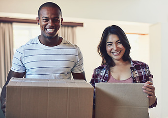 Image showing Box, moving and portrait of happy couple in dream home for property, sale or relocation success. Real estate, mortgage and face of excited people in new house smile for loan, ownership or housing win