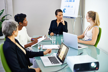 Image showing Meeting, laptop and business people with statistics in discussion, talking and collaboration. Office, corporate and women with chart, graph and research presentation for planning, review and teamwork