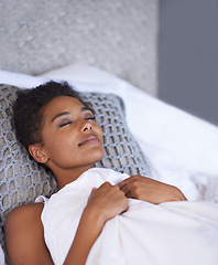 Image showing Black woman, sleeping and bed with duvet sheets for morning, comfort or break at home. Young and tired African female person or model asleep in fatigue for weekend, holiday or peace in the bedroom