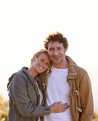 Image showing Happy couple, hug outdoor and portrait in park, love and support with date for bonding and time together. Sunset, nature and people in forest for fresh air, loyalty and commitment with smile