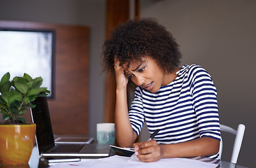 Image showing Woman, finance and thinking of problem at home, table with documents for tax and calculating debt. African female person, bills and stress of online payment report, budget and planning with worry