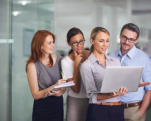 Image showing Group, collaboration and mentor on team helping and training IT to employees in office. People, reading and learning from woman coaching staff with advice for software with feedback on project