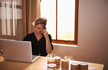 Image showing Laptop, business woman and phone call in home office for networking, technology and freelancer with productivity. Cellphone, entrepreneur and pride with computer for connectivity and online research