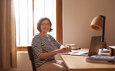Image showing Portrait, businesswoman and positive in home office with confidence, laptop and freelancer with notes for project. Face, entrepreneur and smile for wellness and online research in startup company