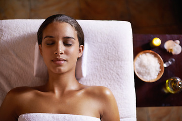 Image showing Top view, spa and massage with woman, wellness and stress relief with luxury and relax with treatment. Person, client or girl with health and weekend break with grooming and vacation with aesthetic