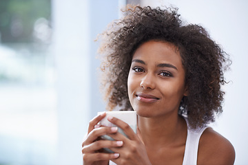 Image showing Black woman, portrait and afro with coffee for morning, breakfast or hot beverage by window at home. Face of African female person with smile or caffeine for drink, latte or cappuccino at the house
