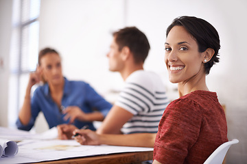 Image showing Woman, office and smile portrait for sitting female person in workspace, planning brainstorming for strategy. Co working, creative design career for employee, happy and business people collaboration