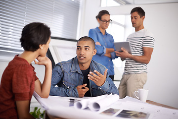 Image showing Business people, creative or brainstorming with conversation, planning or idea with project. Staff, group and teamwork with documents or discussion with meeting or feedback with review or cooperation