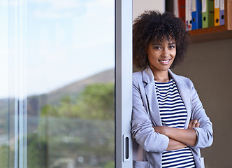 Image showing Black woman, designer and portrait in startup business for entrepreneur, smile or creative company. Face, arms crossed and young afro female person for confidence, happiness and pride in workplace