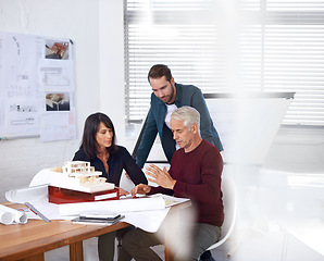 Image showing Architects, teamwork and planning with building model, 3d design and development with colleagues. Remodeling, construction and pointing in meeting, contractor or property developer with lens flare