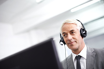 Image showing Customer service, happy and man in office with headset working on online telemarketing consultation. Smile, call center and professional male consultant with crm contact communication in workplace.