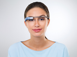 Image showing Portrait, woman or smart glasses for augmented reality, metaverse or innovation in studio isolated on white background. Face, cyber eyewear or future technology for virtual vision of person in Brazil