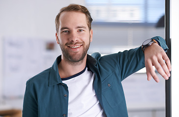 Image showing Portrait, smile and confident with architect man in office, ready for building, design or project development. Architecture, construction and industry with happy young developer in workplace doorway