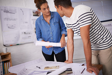 Image showing Architecture, man and woman in meeting with blueprint, paperwork and ideas for building project. Civil engineering, development and teamwork with creative business people in design office together.