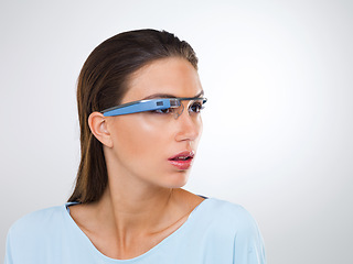 Image showing Thinking, woman and smart glasses for augmented reality, metaverse or innovation. Face, cyber eyewear and futuristic tech, vision and serious person in studio isolated on a white background mockup