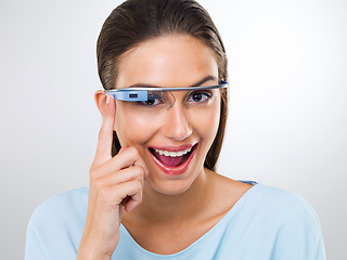 Image showing Portrait, happy woman and smart glasses for augmented reality, vision or metaverse in studio isolated on white background. Face, cyber eyewear or future technology, digital and person laughing online