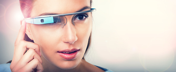 Image showing Woman, futuristic and press glasses for augmented reality, metaverse or internet. Face, cyber eyewear or smart tech for online vision of serious person in studio isolated on a background mockup space