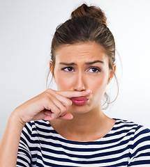 Image showing Thinking, funny and finger moustache with woman, happy and person on a white studio background. Model, mockup space and girl with hand gesture and silly with expression and joke with comedy and goofy