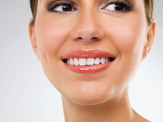 Image showing Woman, face and lips with glow, beauty and skincare in studio, makeup or cosmetics for dermatology on white background. Shiny lipstick, body care and wellness with serum or collagen for antiaging