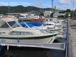 Image showing Some motorboats at a marina