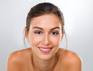 Image showing Woman, face and skincare with smile for beauty, dermatology and antiaging treatment on white background. Happy in portrait, cosmetic care and healthy skin glow with headshot and makeup in studio