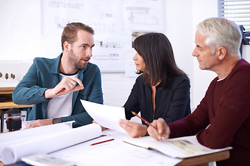 Image showing Architecture, planning and teamwork in meeting with paperwork, discussion and blueprint for building project. Civil engineering, development and business people, men and woman in office brainstorming