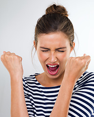 Image showing Excited, woman and celebration of surprise in studio, white background and mockup space for announcement. Happy, energy and college student with screaming emoji for positive feedback or information