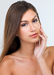 Image showing Woman, portrait and haircare in studio, touch and keratin treatment or brazilian on white background. Female person, closeup and luxury shampoo or conditioner for beauty, cosmetics and dermatology