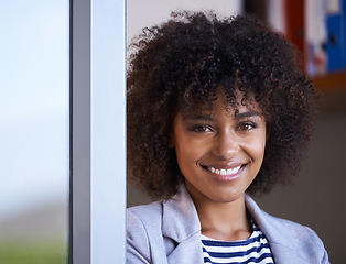 Image showing Portrait, happy black woman and startup company for designer, entrepreneur and creative business in office. Face, smile and young afro female person for confidence, happiness and pride in workplace