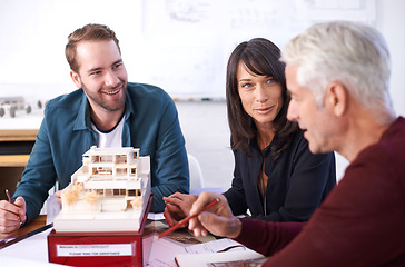 Image showing Architects, collaboration and smile with building model, 3d design and development with colleagues. Remodeling, construction and planning in office, contractor or property developer for project
