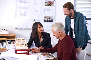 Image showing Architects, collaboration and smile with building model, design and development with team. Remodeling, construction and thinking in strategy meeting, contractor or property developer for project