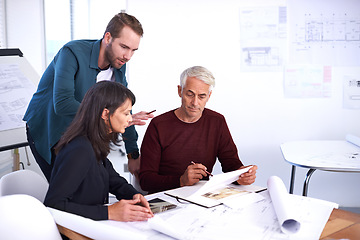 Image showing Architects, collaboration and planning with blueprint, design and development with team. Talking, construction or thinking in strategy meeting, contractor or property developer for project management