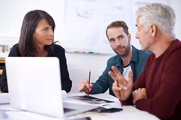 Image showing Architects, laptop and problem solving with office, diversity and meeting and creative partnership. Businessman, plans and engineering with blueprint, brainstorming and discussion for startup agency