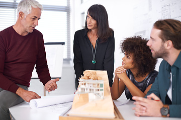 Image showing Manager, meeting and model for industrial architecture, presentation and project layout for construction. Property developers or engineers with 3d graphic or design and remodeling from blueprint.