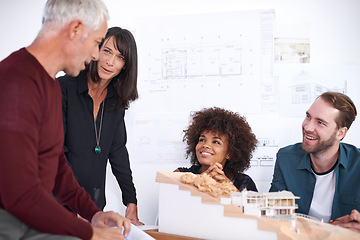 Image showing Employees, meeting and model for industrial architecture, presentation and project layout for construction. Property developers or engineers with 3d graphic or design and remodeling from blueprint.
