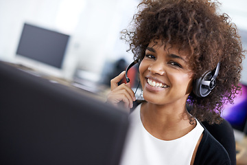 Image showing Call center, happy and woman in office with headset working on online telemarketing consultation. Smile, customer support and portrait of female consultant with crm service communication in workplace
