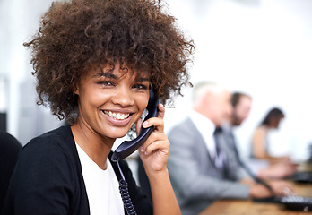 Image showing Woman, portrait and landline in office for customer service with telemarketing, help desk and happiness. Call center, employee and face of consultant with telephone for support, telesales and advice