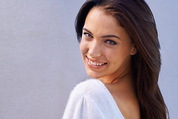 Image showing Happy woman, portrait and jumper in studio for fashion, trendy or cool style with confidence on gray background. Female person, proud and smile in mockup space, stylish and edgy with sweater