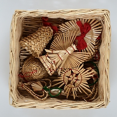 Image showing traditional Christmas straw decorations in a wicker box