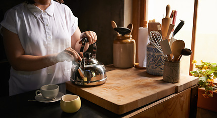 Image showing Prepare, tea and morning in kitchen with hands on kettle for routine process in home. Healthy, matcha or person in house with breakfast beverage to start holiday or vacation and relax with drink