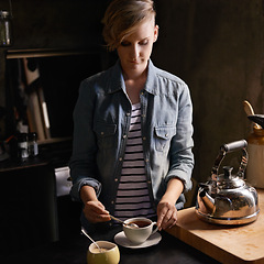 Image showing Morning, tea and woman in kitchen prepare drink for calm break and routine process in home. Healthy, matcha or person in house with breakfast beverage to start day on holiday or vacation and relax