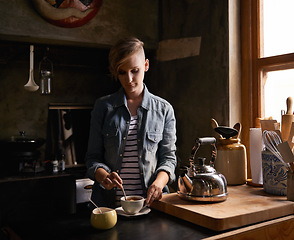 Image showing Morning, tea and woman in kitchen prepare drink for calm break and routine process in home. Healthy, matcha or person in house with breakfast beverage to start day on holiday or vacation and relax