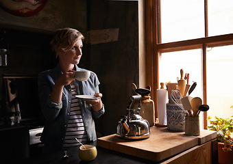 Image showing Morning, tea and woman in kitchen thinking with drink on calm break and routine in home. Matcha, coffee or person in house start holiday or vacation with ideas for future or relax with espresso latte