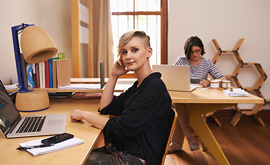 Image showing Portrait, businesswoman and coworking in home office with confidence, laptop and technology for productivity. Face, entrepreneur and pride by cellphone or notes and collaboration in startup agency