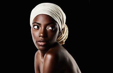 Image showing Beauty, studio and black woman with head scarf, natural makeup or creative aesthetic in mockup space. Art, skincare and African girl on dark background with wrap, facial cosmetics and confidence.