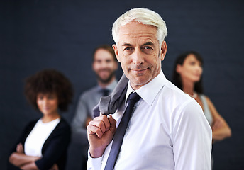 Image showing Mature businessman, portrait and smile for career, studio and manager on wall background. Happy male person, professional and proud of teamwork collaboration, leadership and CEO for startup company