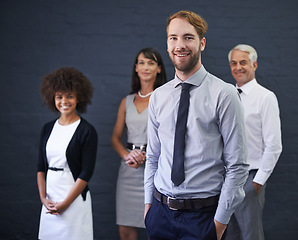 Image showing Business man, portrait and confident for career opportunity, studio and happy on wall background. Male person, professional and proud of teamwork collaboration, leader and smile for startup company